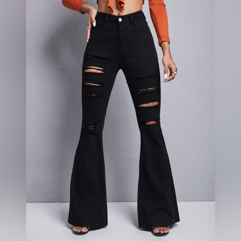 Ripped frayed flare leg jeans